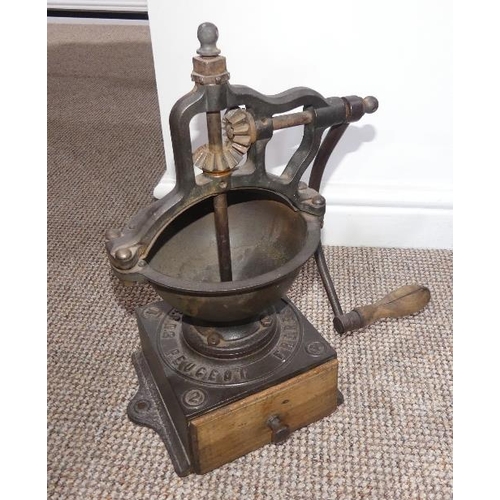 662 - An early 20thC cast iron Coffee Grinder, by Peugeot Freres (2A) with wooden crank handle and collect... 