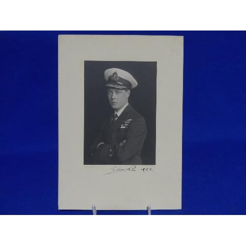 668 - An Edward VIII signed Photograph, in Naval uniform, signed in ink ''Edward P'' as the Prince of Wale... 