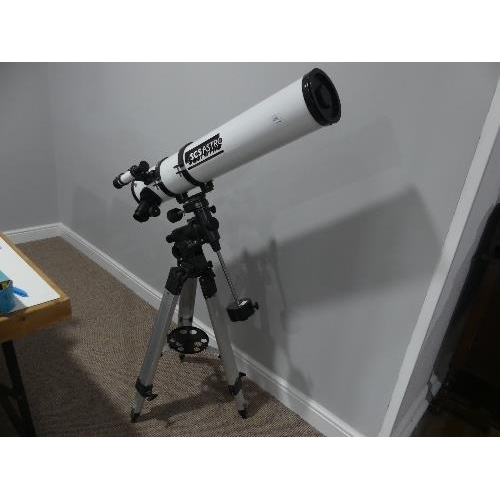 670 - An SCS Astro floor standing telescope, with tripod.