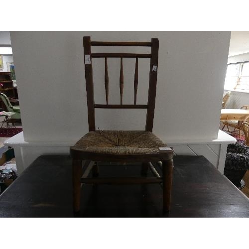 68 - An early 20th century florally painted Child's Chair, with rush seat, together with another child's ... 