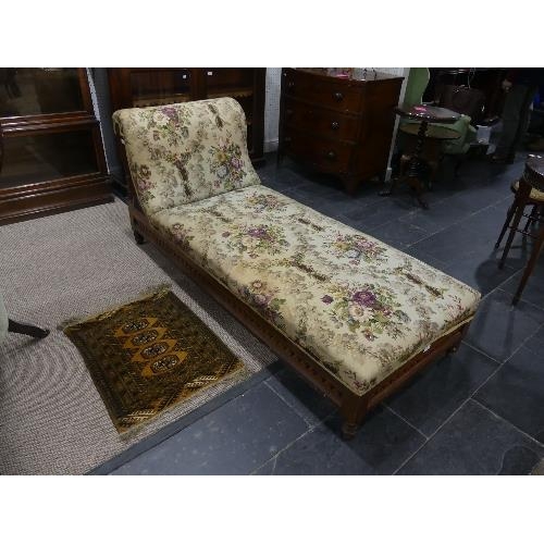 69 - A Victorian mahogany framed Day Bed, with carved and pierced decoration, lacks castors, 72in (183cm)... 