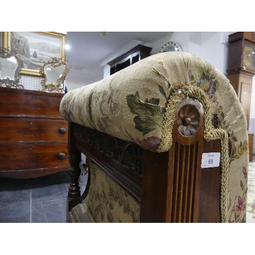 69 - A Victorian mahogany framed Day Bed, with carved and pierced decoration, lacks castors, 72in (183cm)... 