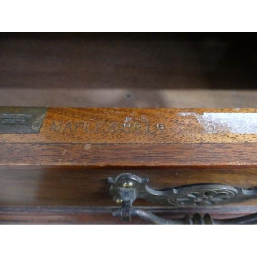 71 - An Edwardian walnut twin Pedestal Desk, by Maple & Co. Ltd., with raised back and tooled leather ski... 