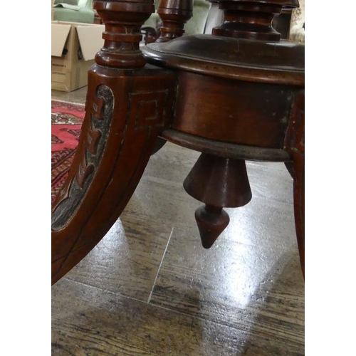 84 - A Victorian walnut oval Breakfast Table, quarter veneered top above a deep frieze, turned quatre-col... 