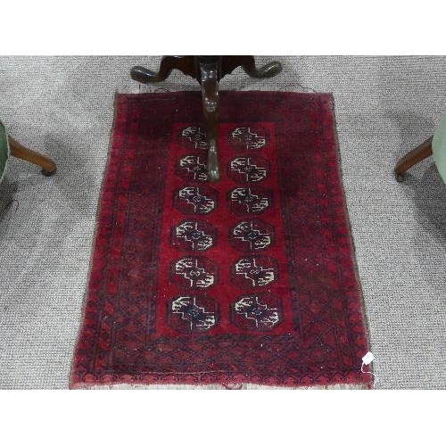 93 - Tribal Rugs; a brown and plum ground prayer rug, 32in x 58in (81cm x 141cm), together with a small m... 