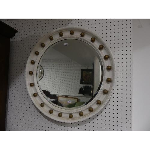 95 - A Victorian circular bevelled edge Wall Mirror, later painted frame, 24¼in (64cm) diameter.