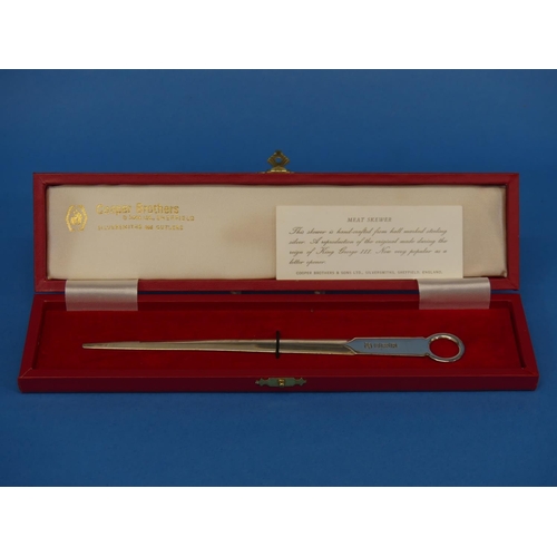 103 - A cased Elizabeth II silver Meat Skewer, by Cooper Brothers, hallmarked Sheffield, 1982, in velvet l... 