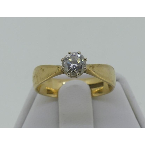 115 - A single stone diamond Ring, the stone of c.½ct, on a wide shank in 9ct yellow gold, Size  P.