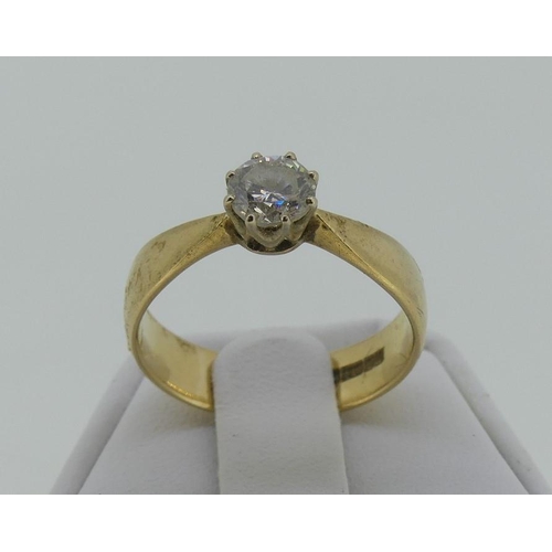 115 - A single stone diamond Ring, the stone of c.½ct, on a wide shank in 9ct yellow gold, Size  P.