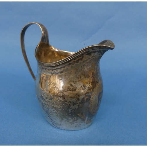 16 - A George III silver Cream Jug, marks probably for Francis Parsons, Exeter, of ovoid form with reeded... 