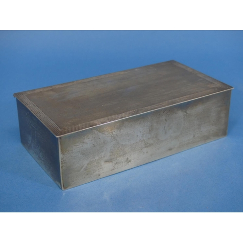 31 - An Edward VIII silver Cigarette Box, by Adie Brothers Ltd., hallmarked Birmingham, 1936, of hinged r... 