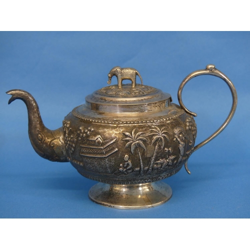 36 - An Anglo-Indian silver three piece Tea Set, unmarked but tested, of circular form, the teapot with c... 