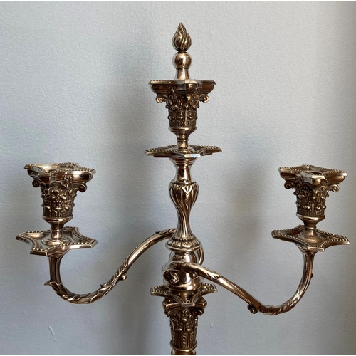 45 - A pair of silver plated three light Candelabra, by James Dixon & Sons, in a classical style with flu... 