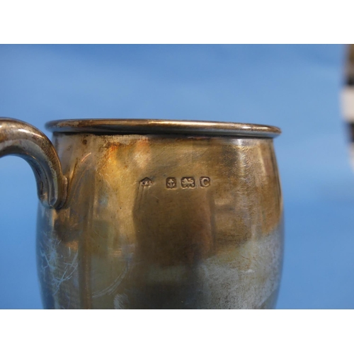 47 - A George V silver Christening Mug, hallmarked Birmingham, 1927, of circular form with plain ring han... 