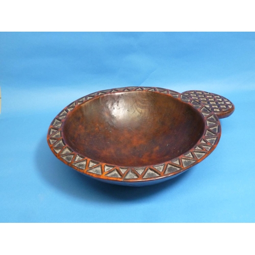 595 - A Tribal geometrically-carved wooden circular Bowl, with protruding circular handle (carved from sam... 