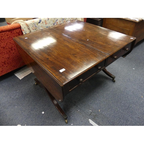 597 - A 19th century mahogany Sofa Table, the rectangular twin-flap top with moulded edge and rounded angl... 