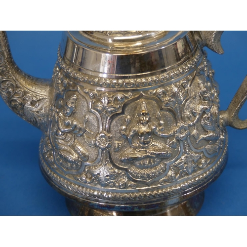 61 - An Indian silver three piece Tea Set, of circular form with scroll handles, the teapot with finial d... 