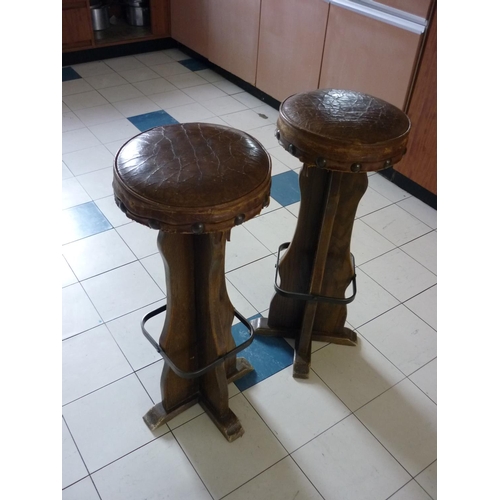 622 - A pair of 20thC high Stools, with circular leather seats, 30in (76cm) high, seats 12in (30.5cm) diam... 