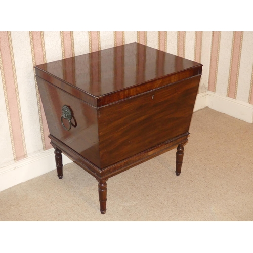 639 - An early 19thC mahogany Wine Cooler, 26in (66cm) wide x 20in (51cm) deep x 26in (66cm) high.