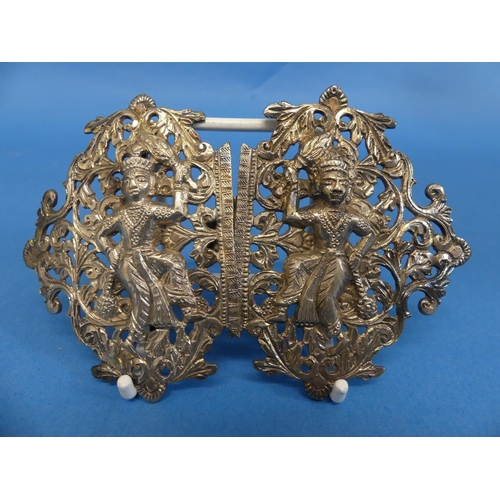 64 - An Indian silver Nurse's Buckle, unmarked but tested, decorated with a central figure in a pierced f... 