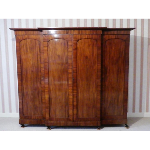 640 - A late Victorian mahogany Compactum Wardrobe, 98in (249cm) wide x 82in (208cm) high x 25in (63.5cm) ... 