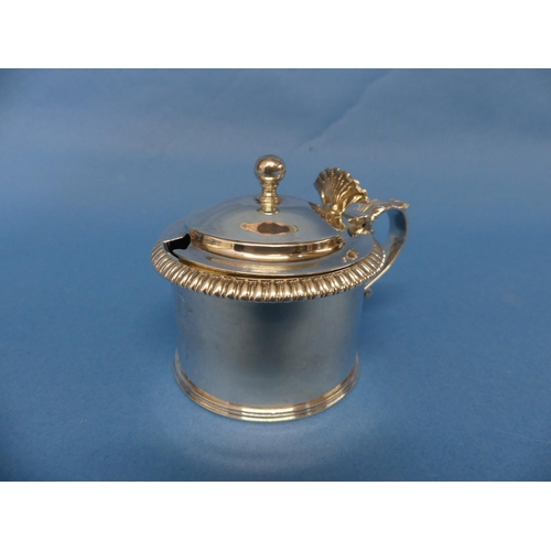 75 - A George IV silver Mustard Pot, by Philip Rundell, hallmarked London, 1822, of circular form,the hin... 