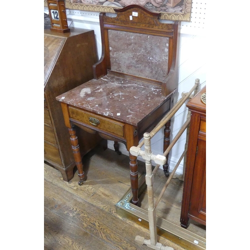 611 - An Edwardian burr walnut mable-topped Washstand, the marble top above one central drawer, raised upo... 