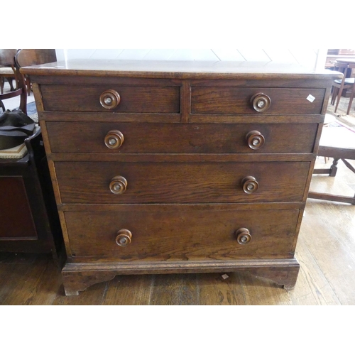 616 - A Georgian oak Chest of Drawers, the two short above three long graduated in size, with turned oak h... 