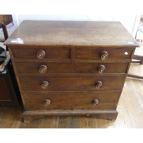 616 - A Georgian oak Chest of Drawers, the two short above three long graduated in size, with turned oak h... 