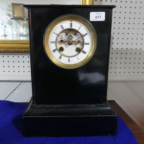 617 - A handsome Victorian black slate Mantel Clock, the eight day movement striking on a bell, 14in high ... 