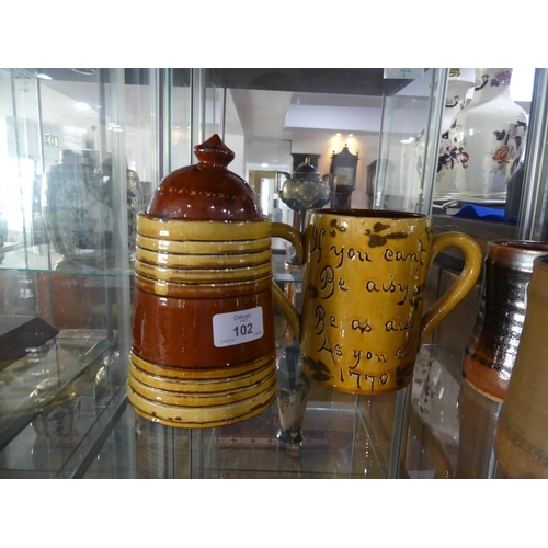 102 - A small quantity of Studio Pottery; comprising two Leach Pottery Tankards, one decorated with brown ... 