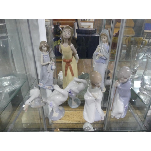 113 - Five Lladro figurines, including Nativity figures Mary and Joseph, together with three Lladro geese ... 
