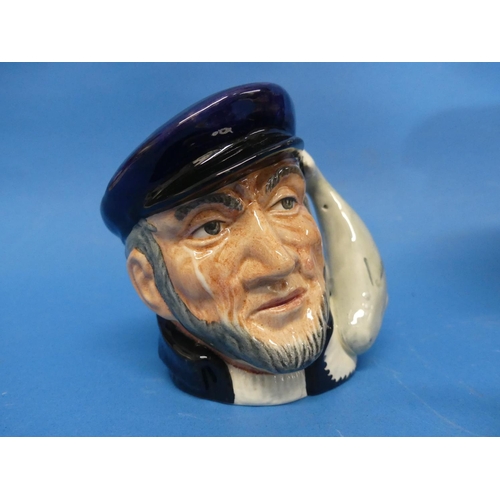 124 - A Royal Doulton 'The Poacher' Toby Jug, of large size, with factory marks to base, together with a s... 