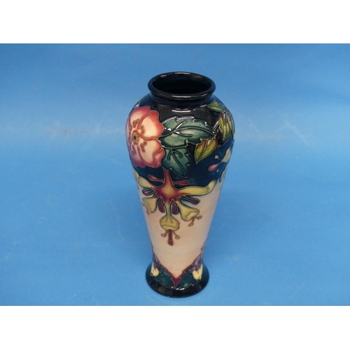 127 - A Moorcroft 'Oberon' pattern Baluster Vase, the tube-lined design with impressed marks to base, date... 