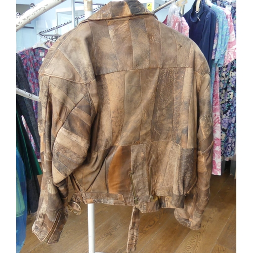 14 - Vintage Fashion, circa late 1980s: a ladies distressed patchwork brown leather bomber jacket, with r... 