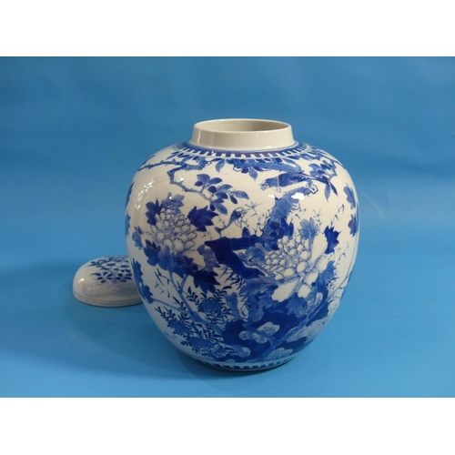152 - A Chinese blue and white porcelain Ginger Jar and Cover, painted with bird, butterflies and chrysant... 