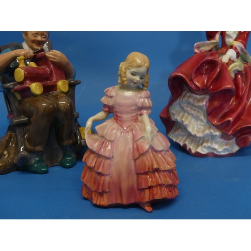 165 - A Royal Doulton 'The Toymaker' figurine, H.N.2250, 5½in (14cm) high, together with two other Royal D... 