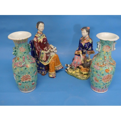 167 - A pair of early 20th century Chinese famille rose porcelain Vases, green ground, applied with fu dog... 