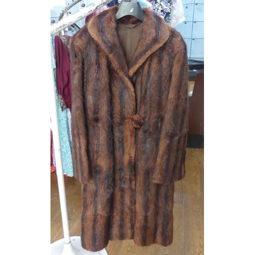 17 - Vintage Fashion: a circa 1950s full length Fur 'Duster Coat', with large feature fur covered button,... 