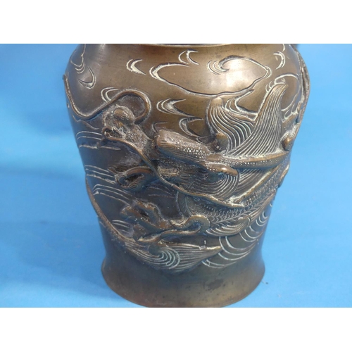 186 - A pair of late 19thC oriental bronze baluster Vases, each moulded in relief in the Japanese style wi... 