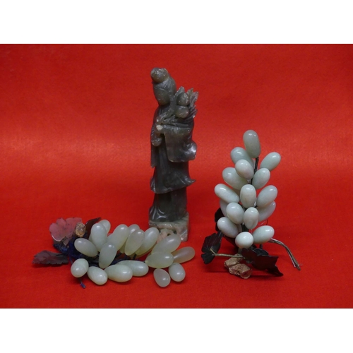 188 - A 20th century Chinese green jade carving of a Bunch of Grapes, and another jade bunch of grapes sim... 