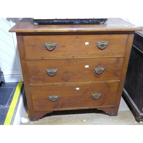 299 - A stained pine three drawer Chest of Drawers, 36in (91.5cm) wide, 34in (86cm) high.