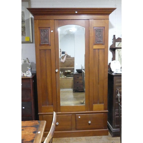 300 - An Edwardian mahogany Wardrobe, with single mirrored door and a drawer below, 54in (137cm) wide x 20... 