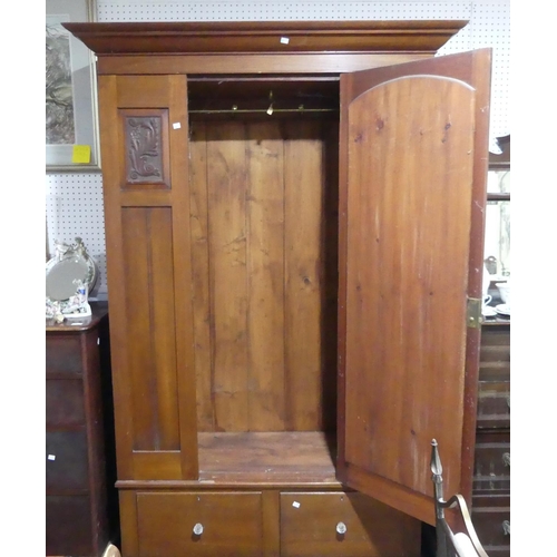 300 - An Edwardian mahogany Wardrobe, with single mirrored door and a drawer below, 54in (137cm) wide x 20... 