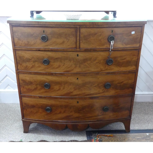 301 - A Victorian mahogany bow-front Chest of Drawers, with two short and three long drawers above shaped ... 