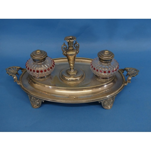 305 - A Victorian silver-plated and cut glass Inkstand, of oval form, the two ink pots flanking a taper ca... 