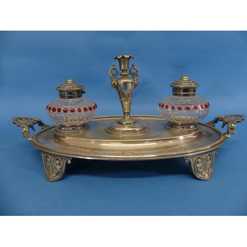 305 - A Victorian silver-plated and cut glass Inkstand, of oval form, the two ink pots flanking a taper ca... 