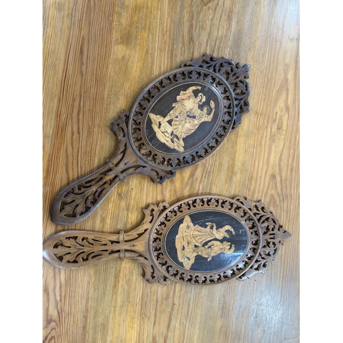 307 - A pair of 19thC oval hand Mirrors, in inlaid fruitwood and open fretwork, 16in (43cm) long (2)