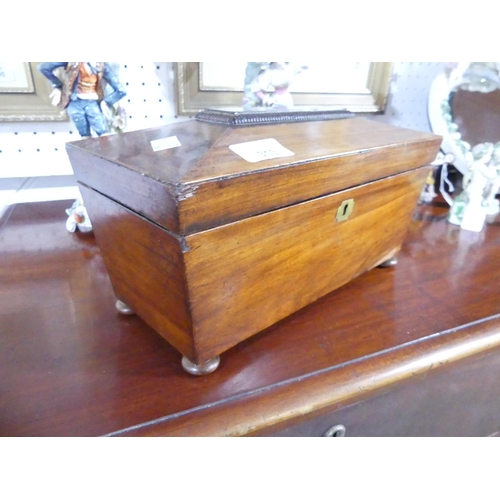 313 - A Georgian rosewood Tea Caddy, of sarcophagus form, with two lidded canisters, on bun feet, 12in (30... 