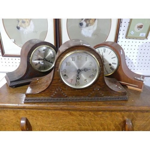 320 - An early 20thC oak cased 'Napoleon Hat' Mantle Clock, 17½in (44cm) wide, together with two other 'Na... 